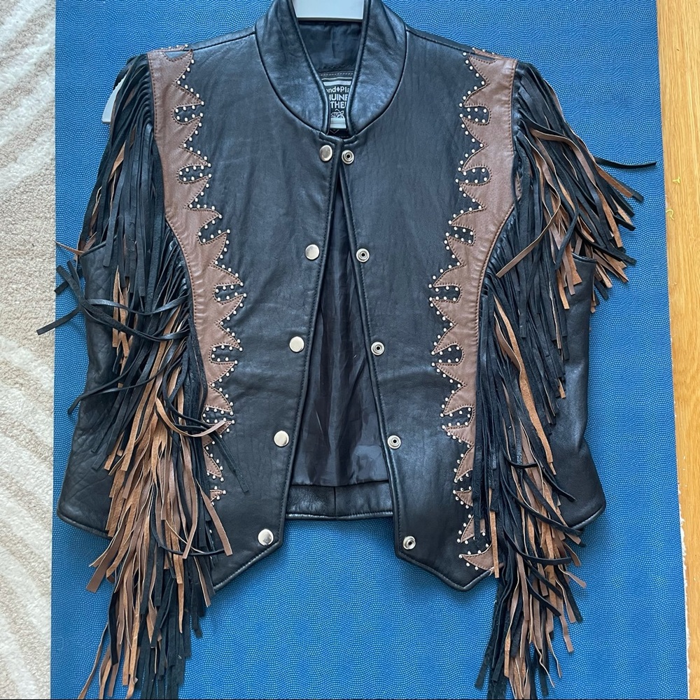 Leather vintage vest. 
Size M but can also look good in size Small too.